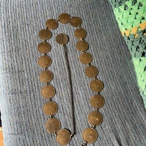 Vintage metal belt. This belt has been around, I just think it is totally cool!